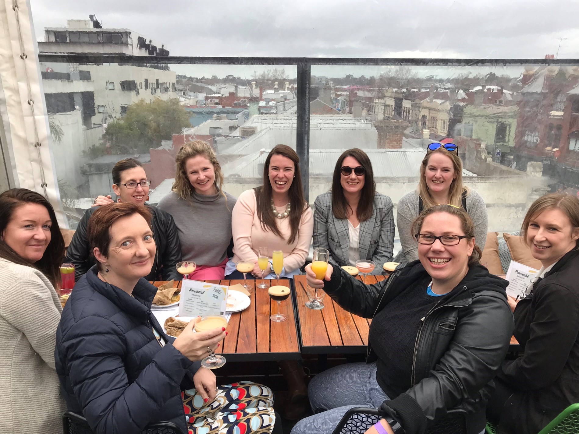 Group of ladies enjoying a rooftop bottomless brunch
